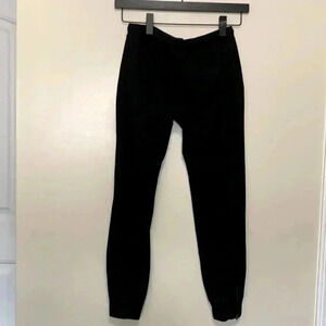 Banana Republic black  sweatpants with zippers at the ankle and a front tie.